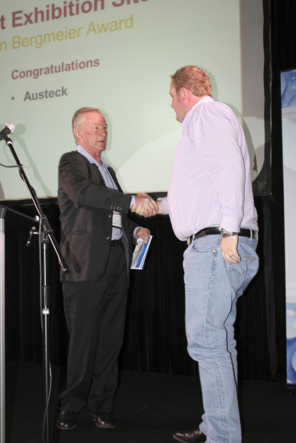 Mr Jim Martin Chairman of WIOA is presenting Mr. Aaron Goth of Austeck the Most Innovative Product Award for the SL-RAT.